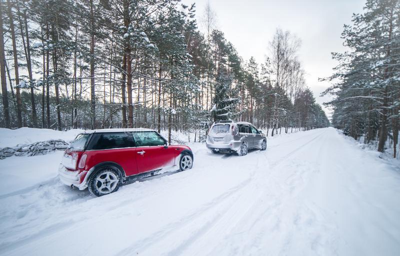 winter-driving-lots-snow-forest-road-cars-difficult